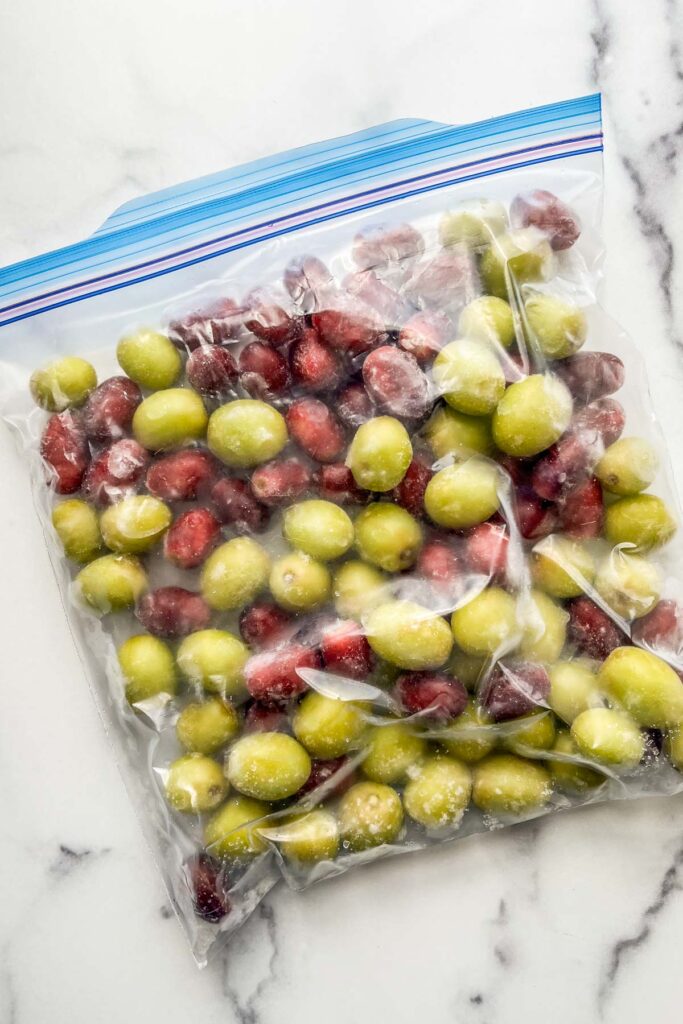 Frozen grapes in a freezer bag.